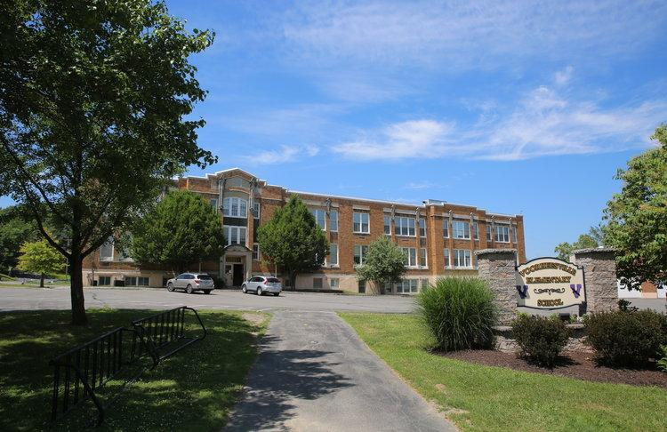 Voorheesville Central School building and school sign